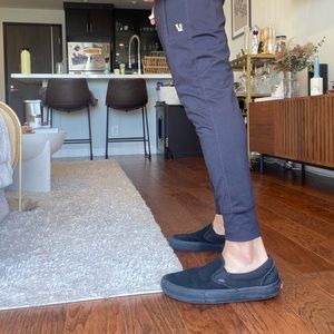 Black suede vans slip on
